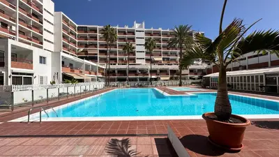Piscina en o cerca de Top-Apartment in Apartamentos Danubio, 4 Etage, Poolblick und seitlicher Meerblick, Wohnzimmer und 1 Schlafzimmer, im Herzen von Playa del Inglés , Gran Canaria