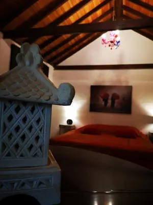 Cama o camas de una habitación en Suite Zen y Cueva Refugio