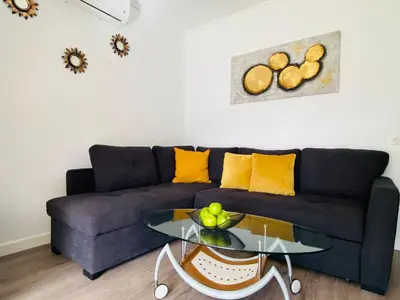 Zona de estar de Parque Golf 16 by SunHousesCanarias
