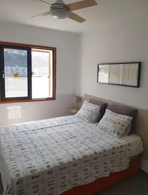 Cama o camas de una habitación en Relax Arimar Apartment Puerto Rico