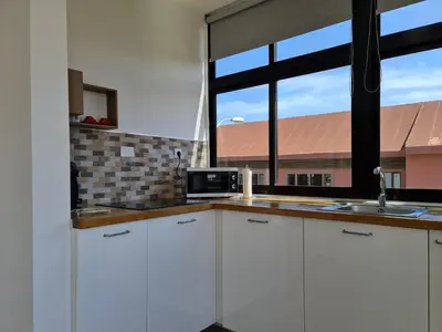 Una cocina o zona de cocina en Yumboflat Two Bedroom Apartment
