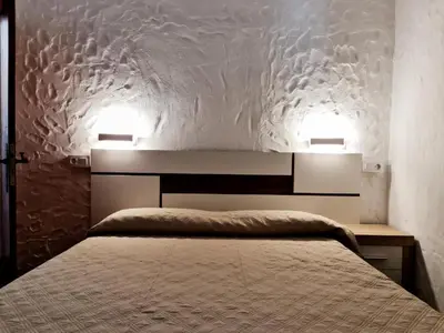 Cama o camas de una habitación en Las Tartanas Two Bedroom Bungalow