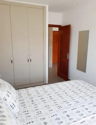 Cama o camas de una habitación en Tranquility Arimar Apartment Puerto Rico