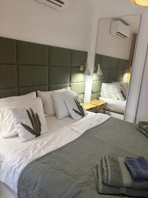 Cama o camas de una habitación en Cactus Sombrerudo- bright apartment next to Yumbo