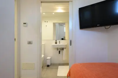 Un baño de FaroVela Suites Pasito Blanco