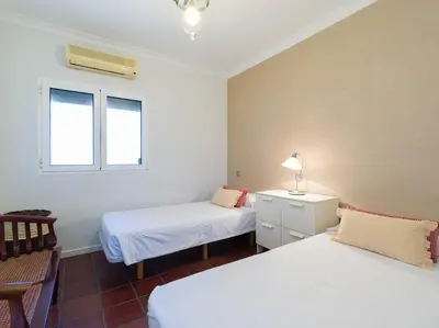 Cama o camas de una habitación en FaroVela Suites Pasito Blanco