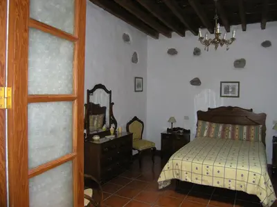 Cama o camas de una habitación en Vivelorural la casita de Andrés 2, Agüimes