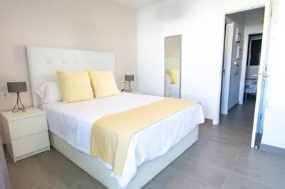 Cama o camas de una habitación en Bungalow Parque Gaviota 4 by Homestaygrancanaria