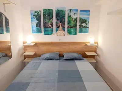 Cama o camas de una habitación en Paraiso by CASAS COCODRILO