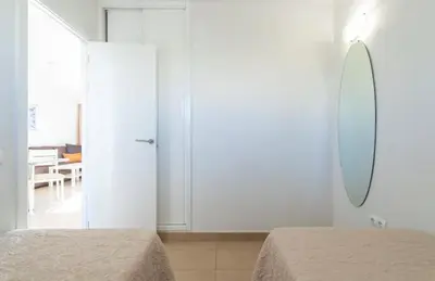 Cama o camas de una habitación en Apartamentos Liszt