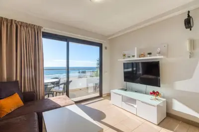 Una televisión o centro de entretenimiento en Apartamentos Liszt