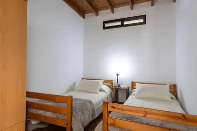 Cama o camas de una habitación en Vivienda vacacional CA' PEPITA Y JOSE