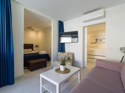Cama o camas de una habitación en Sol Suites Puerto Rico
