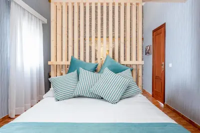 Cama o camas de una habitación en DejaBlue Villa privada entre mar y montaña