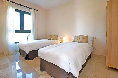 Cama o camas de una habitación en Salobre Morro Golf 6