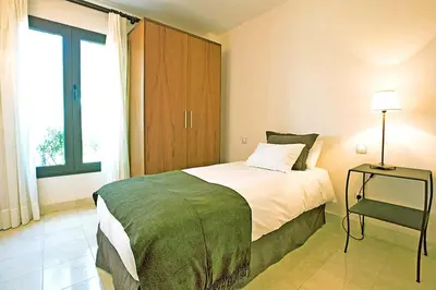Cama o camas de una habitación en Salobre Morro Golf 6