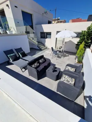 Zona de estar de Ocean Surf Suite