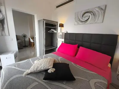 Cama o camas de una habitación en PLAYA DEL INGLES -2 balcons- AGAETE PARQUE