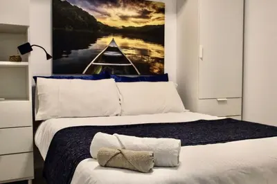 Cama o camas de una habitación en Vivienda Crispin