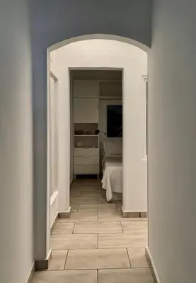 Cama o camas de una habitación en Vivienda Crispin