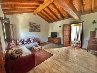 Una televisión o centro de entretenimiento en Casa en La Ladera - Real vibe - Beach & Mountain