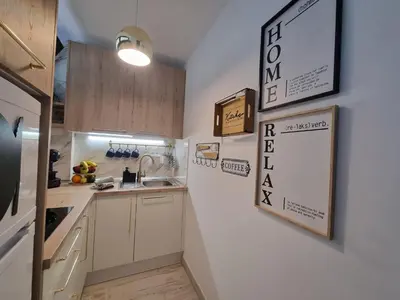 Una cocina o zona de cocina en Top Apartament Playa del Ingles