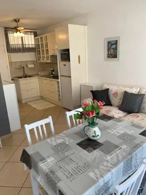 Una cocina o zona de cocina en Appartamento confortevole con piscina 7