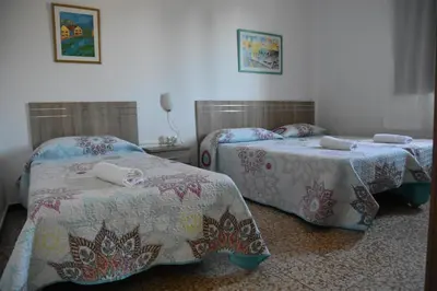 Cama o camas de una habitación en Pension Eva
