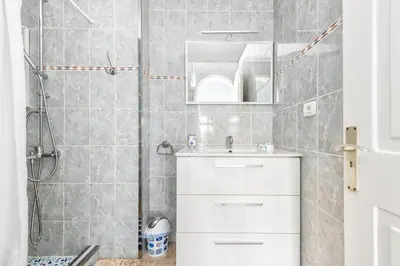 Un baño de Lovely Apartament Taidia