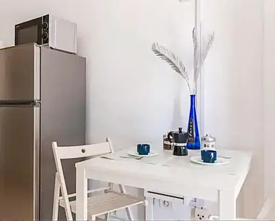 Una cocina o zona de cocina en Lovely Apartament Taidia