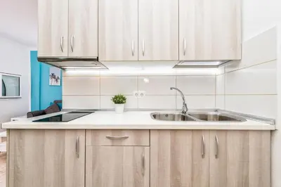 Una cocina o zona de cocina en Lovely Apartament Taidia