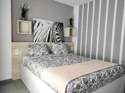 Cama o camas de una habitación en Las Palmas Golf & Beach