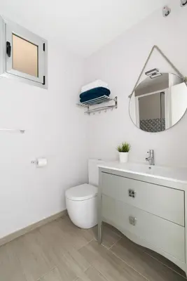 Un baño de Home2Book Cozy Apartment Beach Front Las Canteras