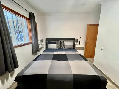 Cama o camas de una habitación en Cura Sol Appartment Amadores