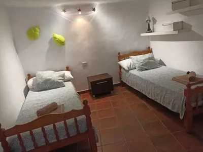 Cama o camas de una habitación en Casa Rural La Yedra San Mateo