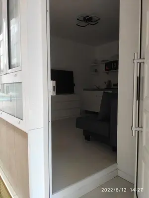 Una televisión o centro de entretenimiento en Winnie's Homestay