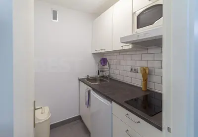 Una cocina o zona de cocina en Moderno Estudio con terraza en Las Canteras