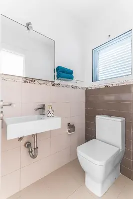 Un baño de Home2Book Stylish Front Line Las Canteras Beach