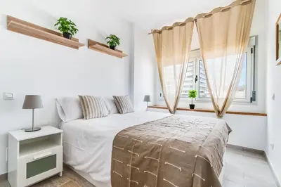 Cama o camas de una habitación en Home2Book Delightful Apartment Las Canteras
