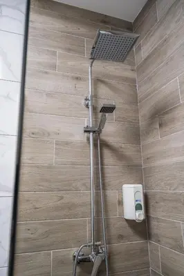 Un baño de Paquesito Home