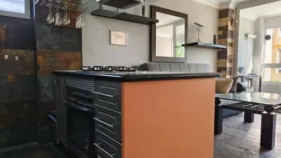 Una cocina o zona de cocina en Lizards Lounge - Tanife Apartment beim Yumbo