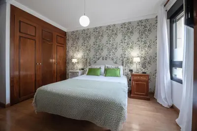 Cama o camas de una habitación en La Minilla Suite
