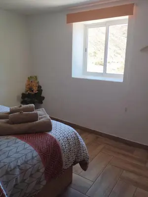 Cama o camas de una habitación en Casa Azul Mountain Retreat