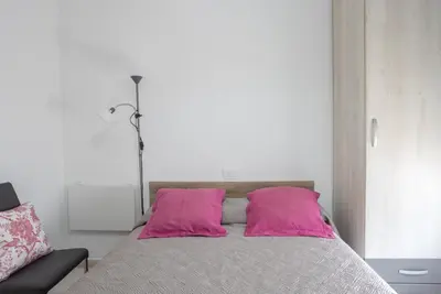 Cama o camas de una habitación en Flatguest Las Canteras Beach 10 + Wifi + 5 Pax