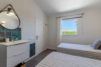 Cama o camas de una habitación en Beach Luxury Bungalow