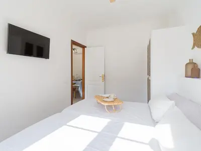 Cama o camas de una habitación en MoganSol Apartment