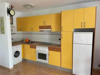 Una cocina o zona de cocina en Descubre el bungalow perfecto para tus vacaciones