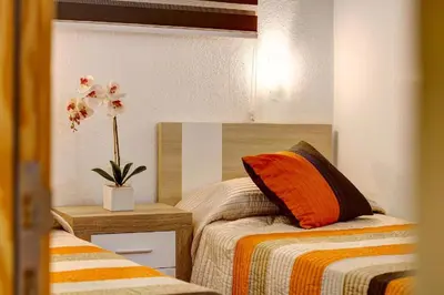 Cama o camas de una habitación en Los Elefantes Beach House