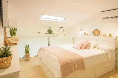 Cama o camas de una habitación en APARTAMENTO GRAN CANARIA 1º LINEA