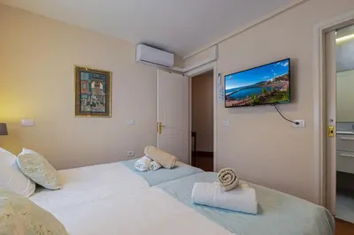 Cama o camas de una habitación en Balcon del Mar MG by VillaGranCanaria